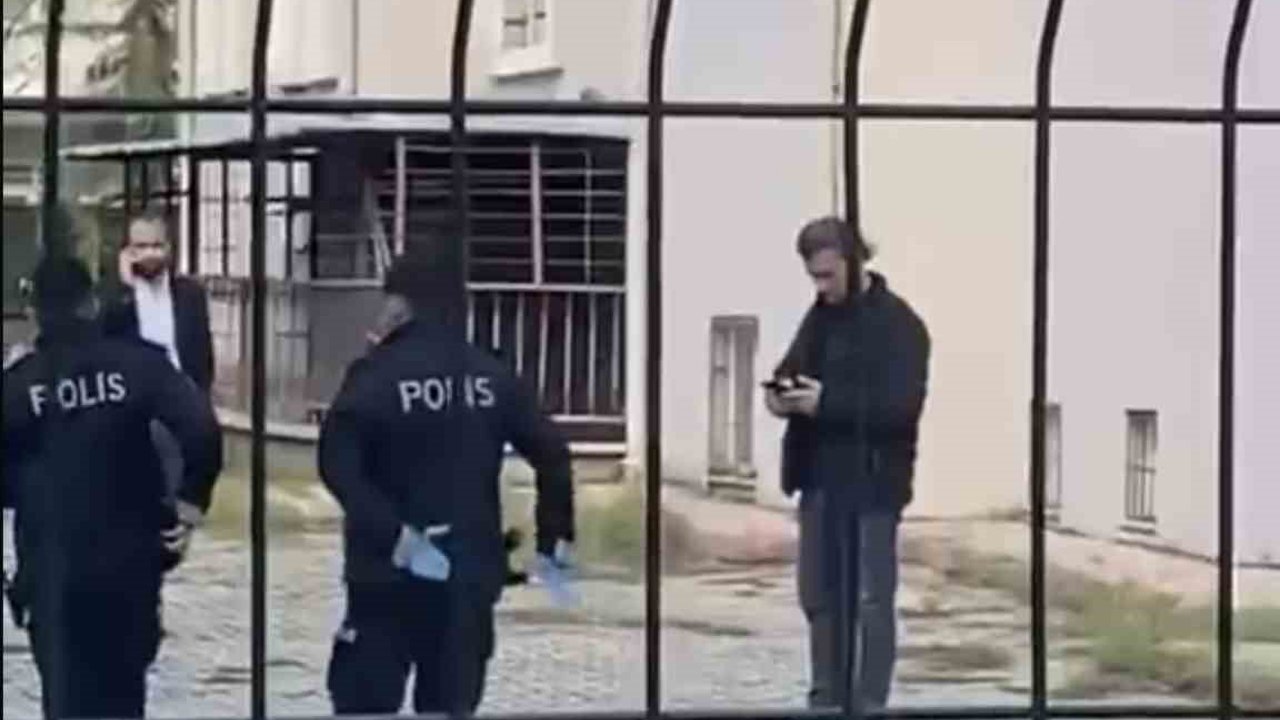 Polisten kaçan şahıs, tabancasını okul bahçesine attı