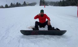 Snowboard yaparken Türk Kahvesi yudumladı