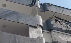 Balkon filesine sıkışan güvercin kurtarıldı