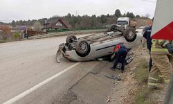Takla atan otomobilden yara almadan kurtuldu