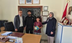 Edikli’de selde yavru köpekleri kurtaran Efe’ye ödül