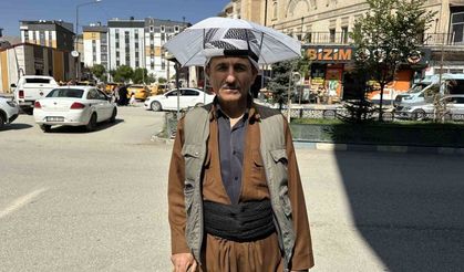 Vatandaş yıllardır kafa şemsiyesiyle güneşten korunuyor