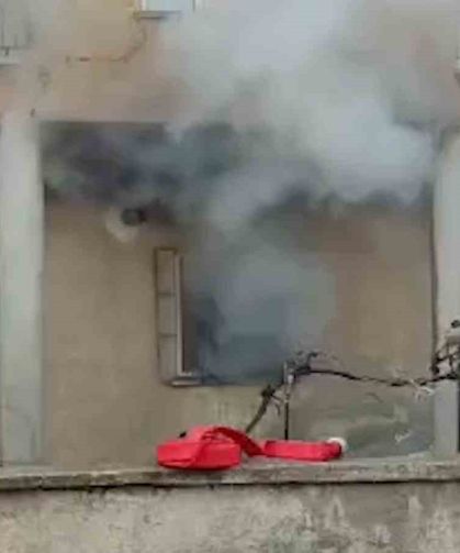 İtfaiyeci gaz sızdıran tüpü eliyle taşıyarak facianın önüne geçti