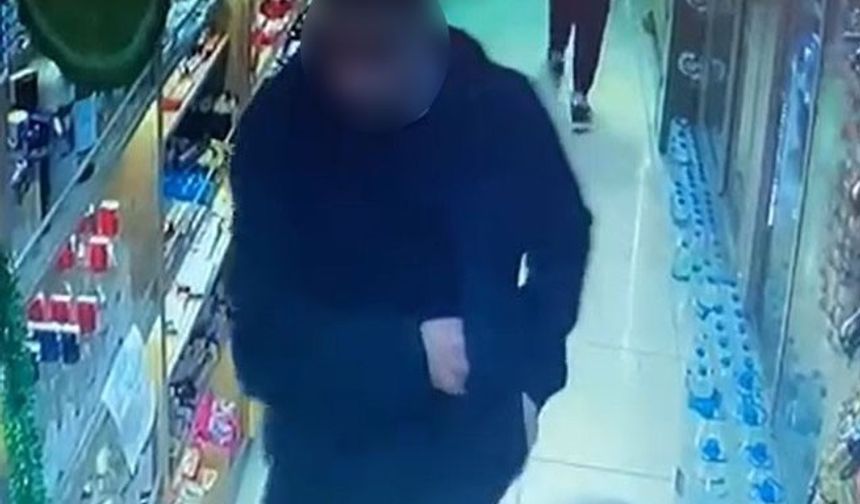 Marketten alkollü içecek çalan şahıs kameraya yakalandı
