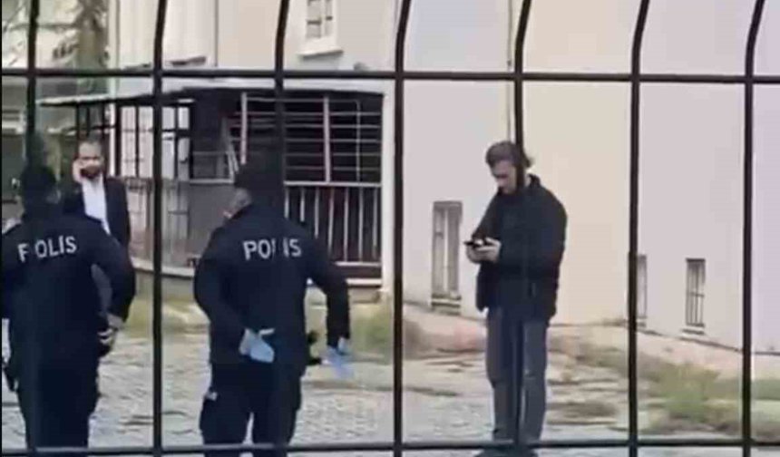 Polisten kaçan şahıs, tabancasını okul bahçesine attı