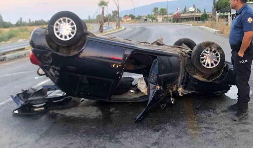 Ters dönen otomobildeki sürücü, sıkıştığı yerden kurtarıldı